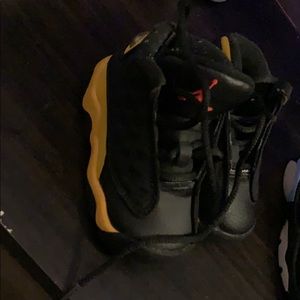 Black and Gold Air Jordan 13